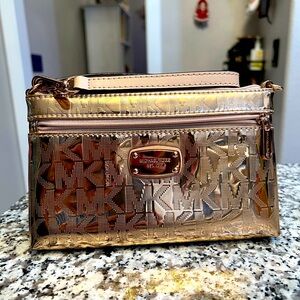 Michael Kors jet set wristlet rose gold metallic